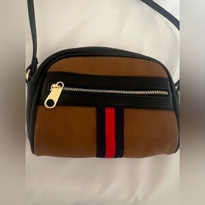 Suede Crossbody or shoulder bag with 2 small inside pockets and one zip front